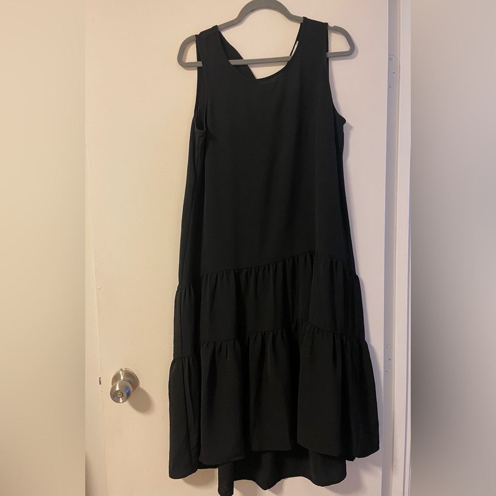 Nicole Miller size medium, black, ruffle, hem dress. Like new.